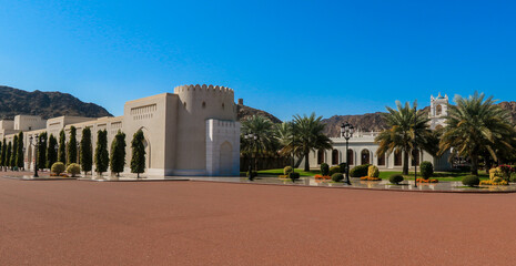 Exploring the stunning architecture and tranquil gardens of Muscat Oman on a sunny day