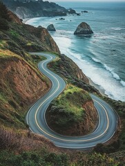 Obraz premium Twisting Road in a Coastal Landscape
