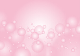 ピンク色のグラデーション背景にシャボン玉