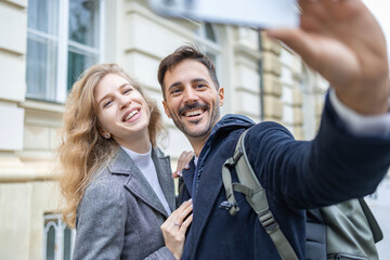 Happy Couple Taking Selfie Outdoors in Urban Setting