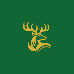 A striking golden silhouette of a deer proudly stands out against a lush green backdrop, capturing the essence of wilderness and elegance