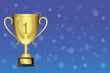 Winner's gold cup for first place side view on background with bokeh effect.