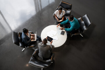 Top View of Diverse African Team in Collaborative Meeting