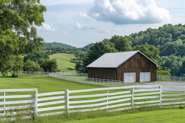 Obraz premium Horse Barn in Scenic Kentucky Countryside with White Fence