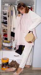woman searching clothes ,nothing to wear. High quality photo