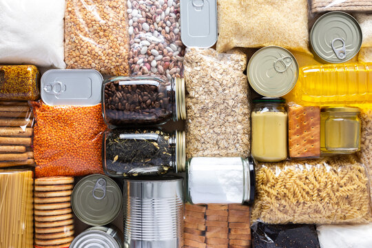 Home food supplies for quarantine and isolation, including canned food, cereals, pasta, and essential staples for survival, survival during military operations, the concept of stay at home