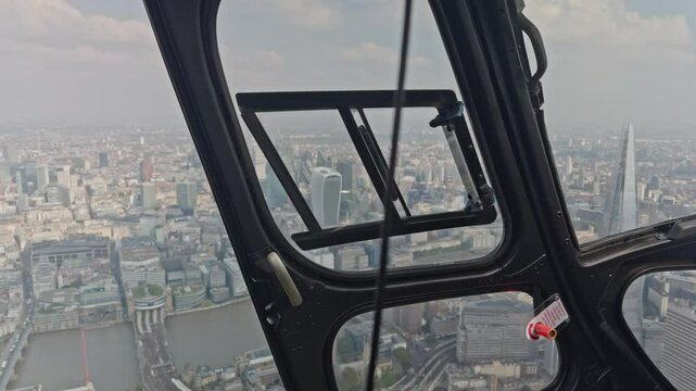 filming from inside a helicopter over london