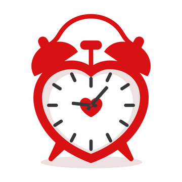 Red alarm clock in the shape of a heart