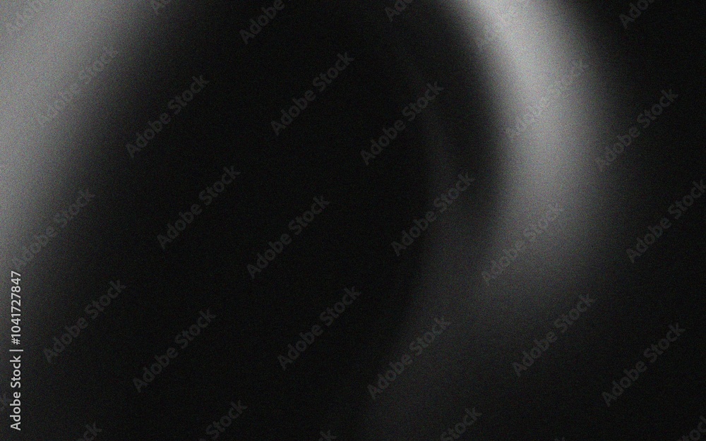 Leinwandbilder abstract black and white background with a blurred light source creating a halo effect.