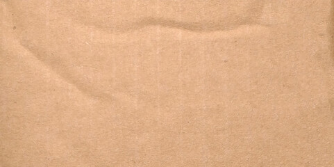 Abstract brown recycled paper background. Old Kraft paper texture box craft stripes pattern. top view.