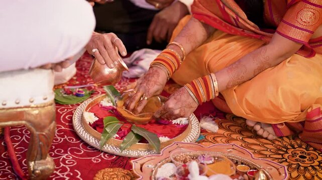 Traditional wedding ceremony in Hinduism: Turmeric in bowl for haldi ceremony