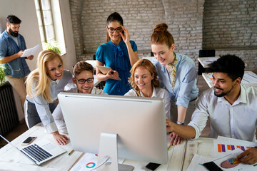 Programmers working in a software developing company office. Business people as a team