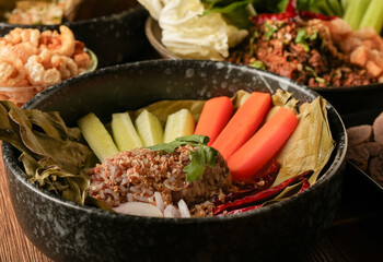 Laab Thaifood menu, raw food. laab moo mee of the North Lanna Thai food style, on table background. thaifood concept. Lanna Thai food.