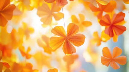 Obraz premium Close-up of a vibrant garland of paper marigolds hanging in the breeze, bright orange and yellow petals gently blowing, soft sunlight creating a festive and cultural mood. Day of the Dead