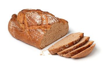 Fresh homemade whole sliced loaf of wheat and rye bread isolated on white background close up