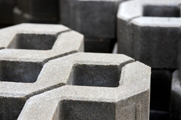 Checkered Concrete Cinder Tiles Of A Garden Sidewalk Lawn In Palette. Turf Grass Block Paving Stones. Grasscrete is eco friendly material for driveways, parking lots or garages instead of concrete