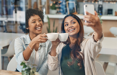 Women, friends and cheers on selfie at coffee shop on date for memories, social media and post. People, happy and cafe or restaurant on break for support, trust and care with bonding and networking