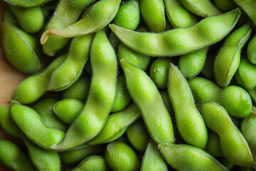 Top view of fresh harvest edamame, Selective focus pile of green soybean.