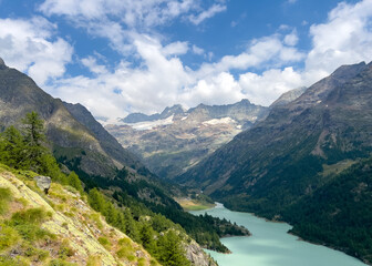Lake place moulin and mountain with eternal snow glacier. Copy space