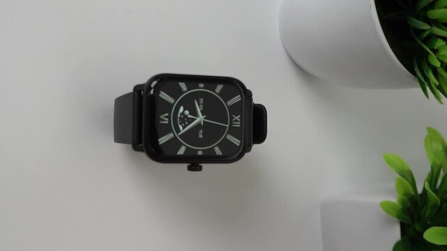 Smart watch with black strap isolated on white background