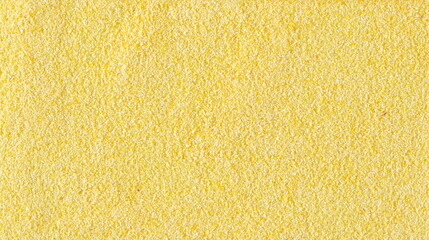 Corn polenta pile background and texture, uncooked