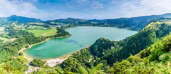 A view from the crater rim over the Lake at Furnas on the island of San Miguel in the Azores in...