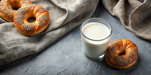 Glass of Milk and Poppy Seed Pastries on Gray Fabric - Delicious Flour Products for Culinary Inspiration