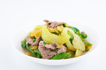 A dish of home-cooked green tomato beef