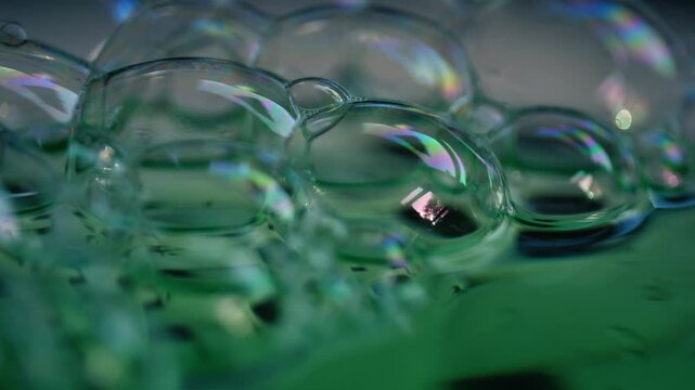 Green water bubbles close up macro shot 