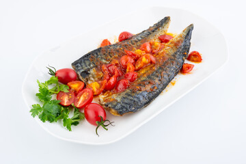 A plate of mackerel with tomato and sweet and sour sauce