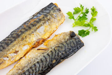 A plate of fried mackerel fillet
