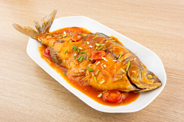 Chinese food tomato sweet and sour fish