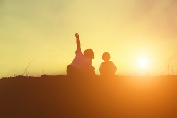 kid silhouette,Moments of the child's joy. On the Nature sunset