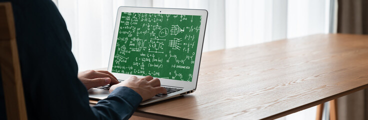 Mathematic equations and modish formula on computer screen showing concept of science and education
