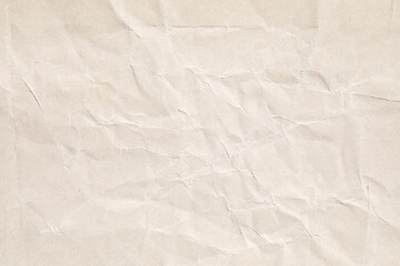 Brown crumpled kraft paper texture macro closeup