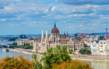 Obraz premium View of the Hungarian Parliament Across the Danube River in Pest from Buda Castle in Budapest, Hungary.