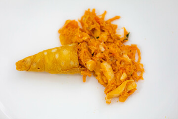 Traditional savory straws stuffed with chicken and hearts of palm