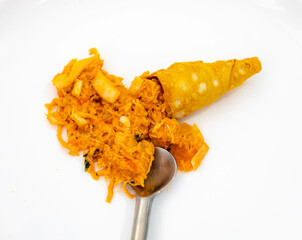 Traditional savory straws stuffed with chicken and hearts of palm