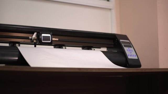 Plotter cutting.cutting.cutting paper. High-quality shooting in 4K format.