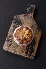 Sweet puff tart with meringue, cream and nuts