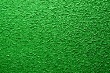 Fototapeta premium Rough textured green background with a tilted angle