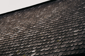 This is a closeup view of a timeless slate roof, showcasing its unique texture and beautifully weathered appearance