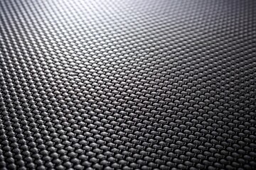 Depth of field black matte plastic background texture with soft blur effect