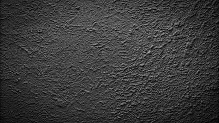 textured black plaster wall with tilted angle