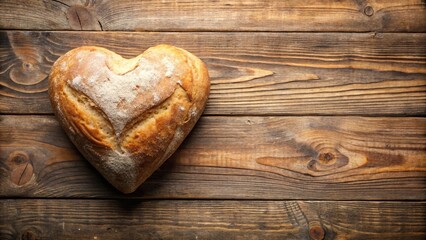 Depth of Field Heart Shaped Loaf of Bread on Rustic Wooden Table