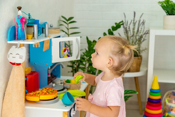 little girl playing with toys. Selective focus