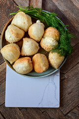 Fresh baked home made  Mini cheese puff pastries.Cheese pie with phyllo pastry and herbs