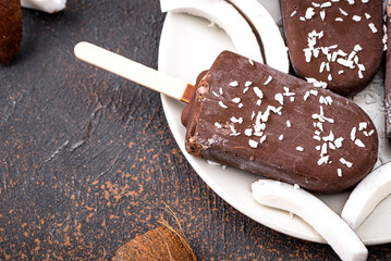 Coconut popsicles in chocolate glaze