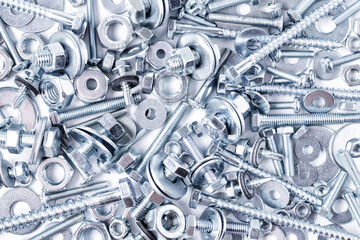 Mixed screws and nails. Industrial background. Home improvement.bolts and nuts.Close-up of various...