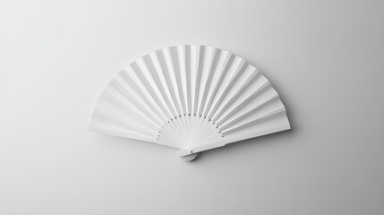 Minimalistic hand fan mockup design featuring a white folding fan against a seamless white background.